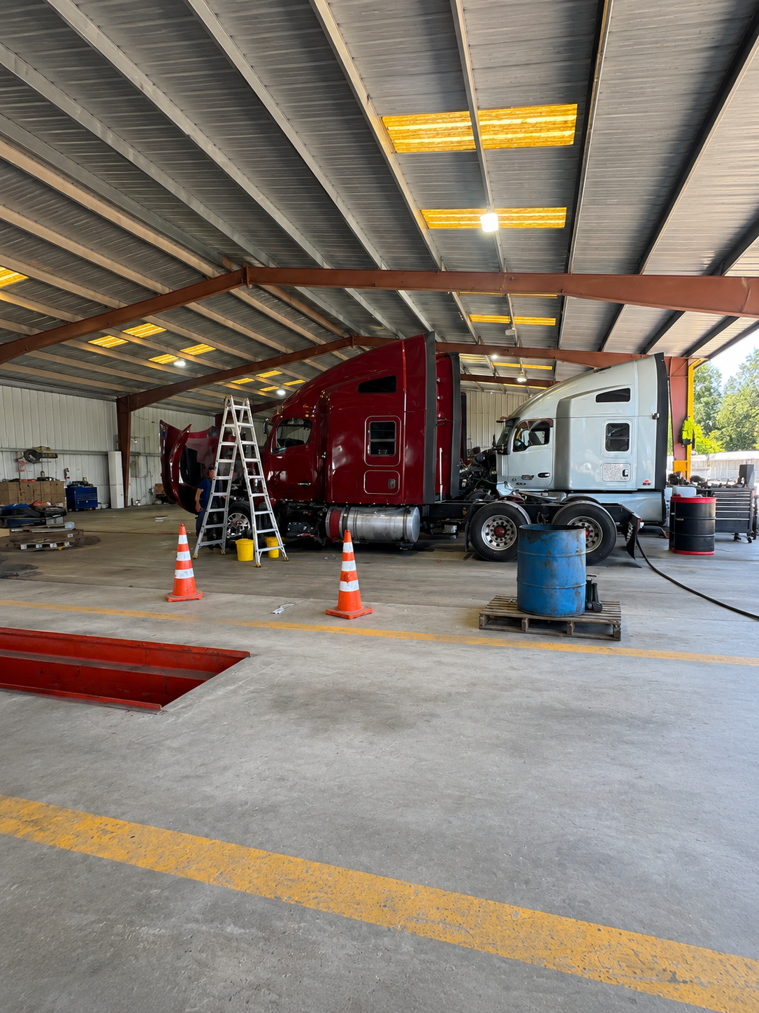 Truck inside the M&M Repair Road Service bay